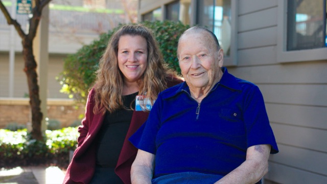 Provider sitting with patient